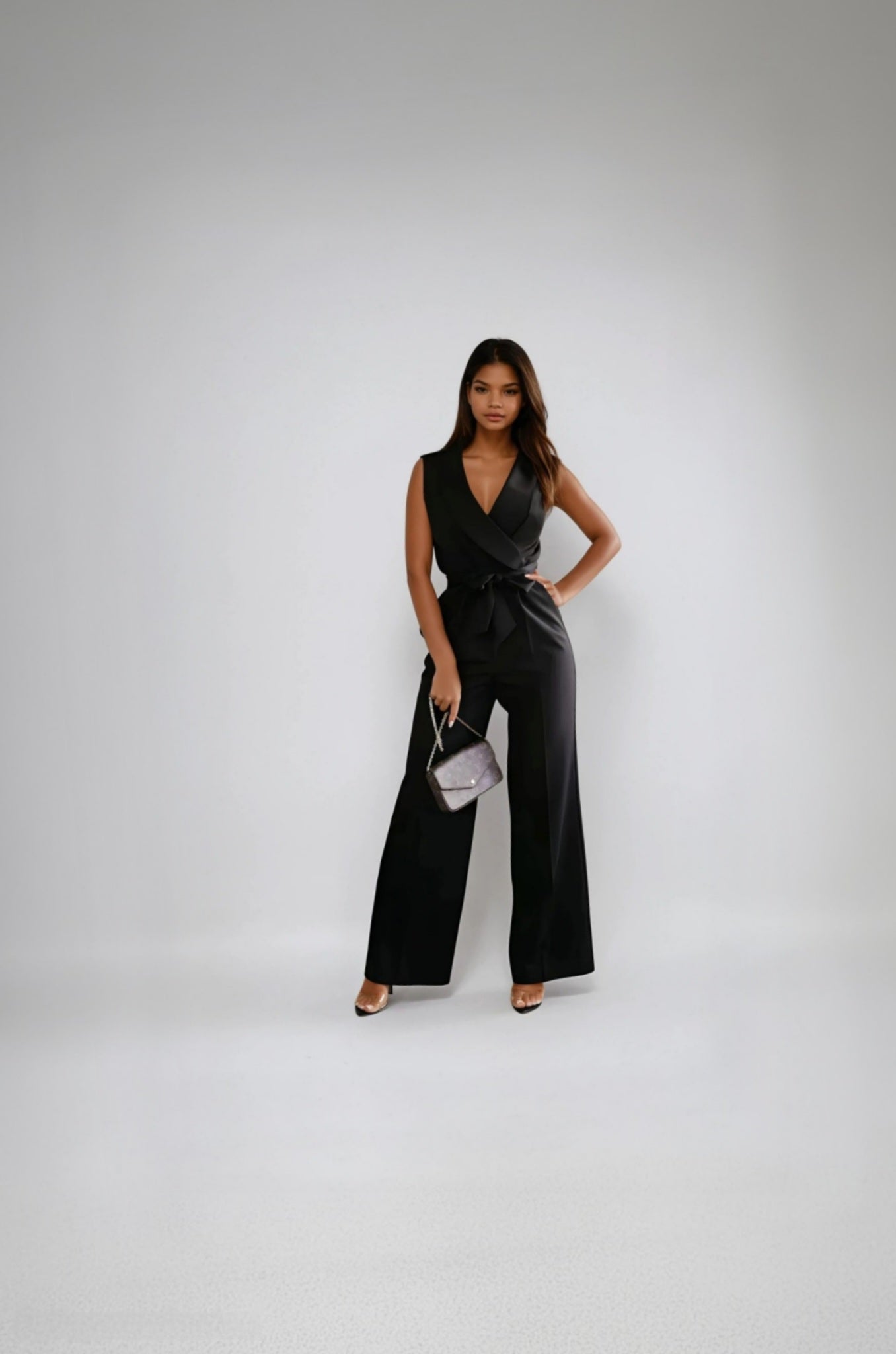 Angela | Ärmelloser Flared-Jumpsuit mit V-Ausschnitt